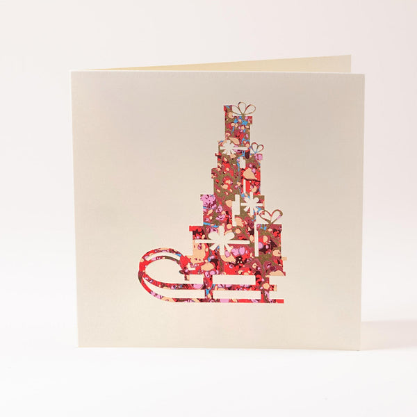 Grusskarte  "Schlitten mit Geschenken"
