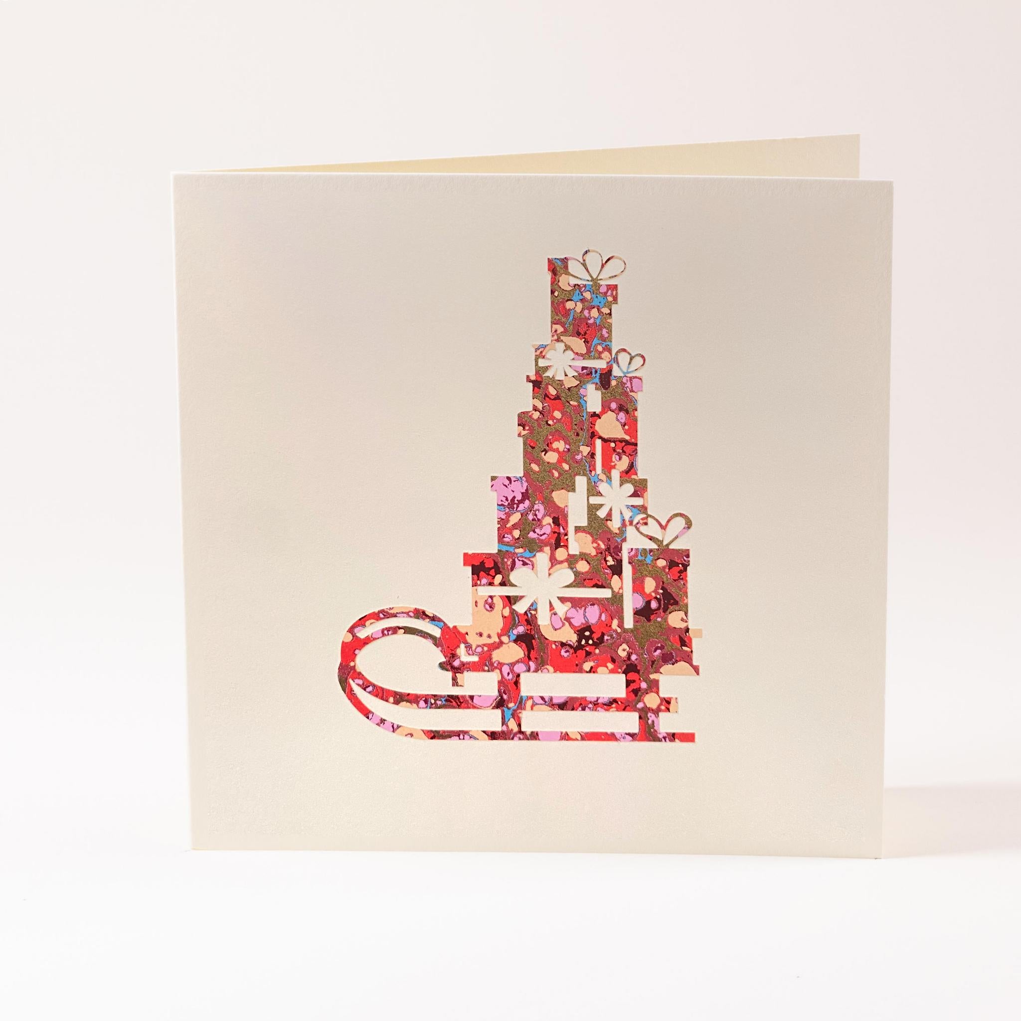 Grusskarte  "Schlitten mit Geschenken"
