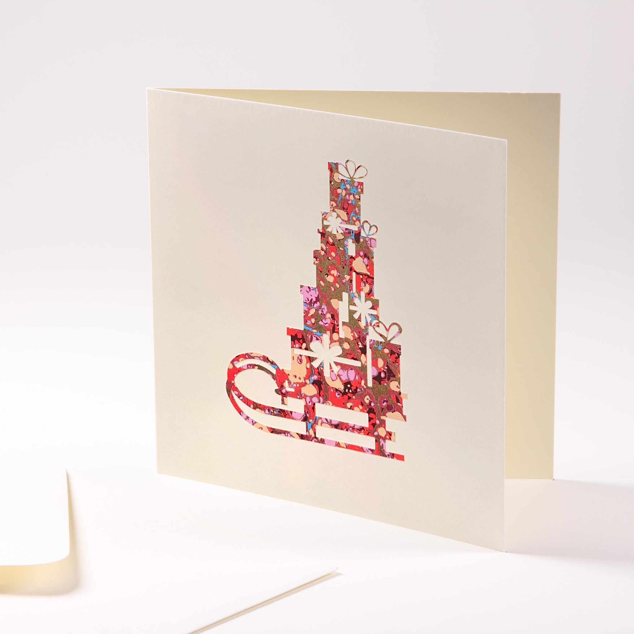 Grusskarte  "Schlitten mit Geschenken"