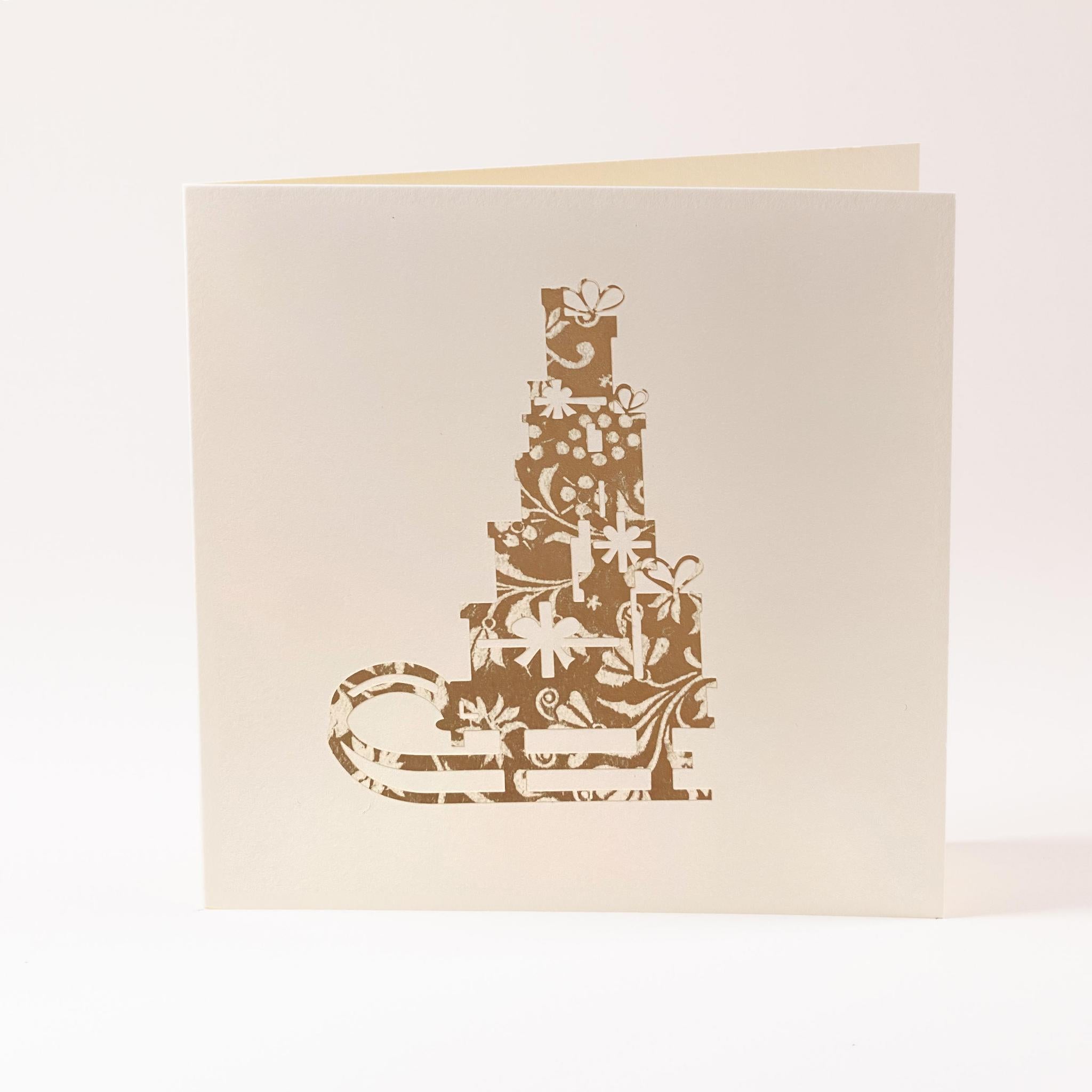 Grusskarte  "Schlitten mit Geschenken"