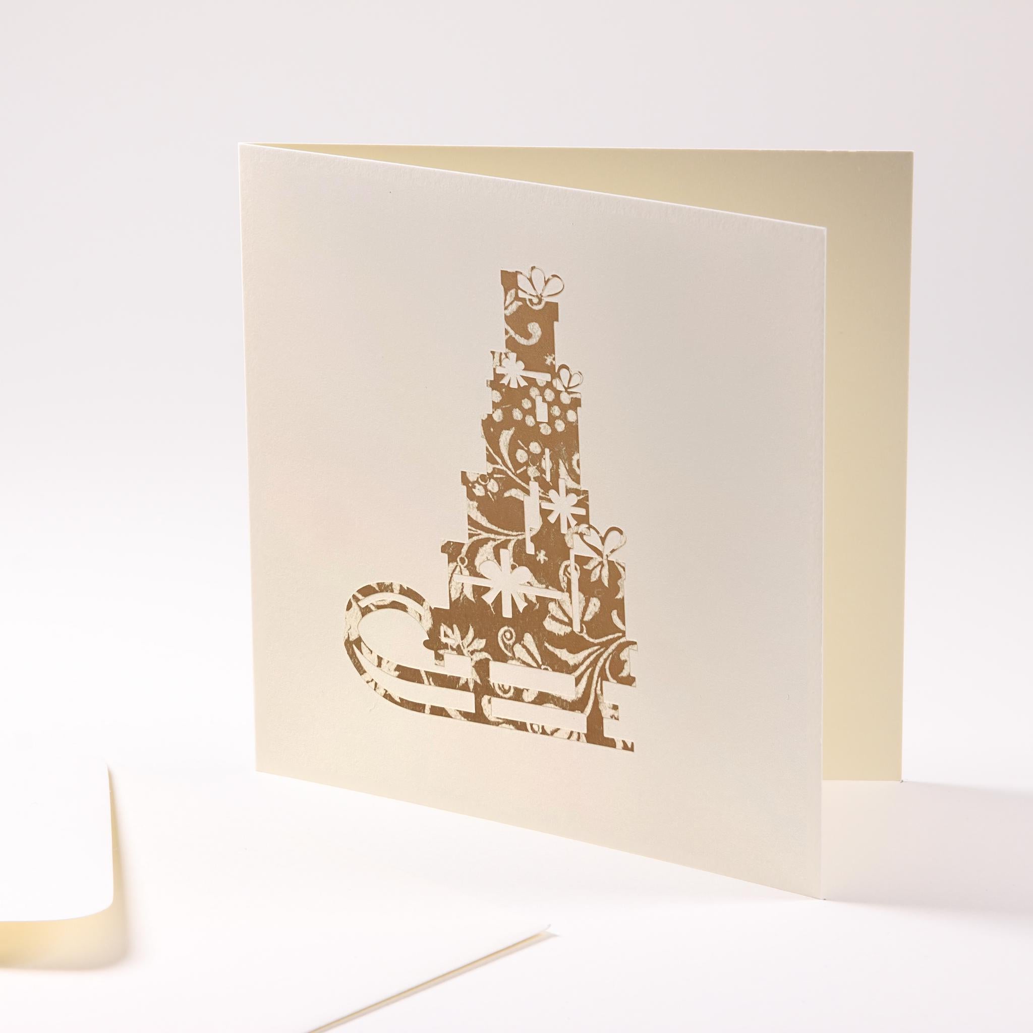 Grusskarte  "Schlitten mit Geschenken"